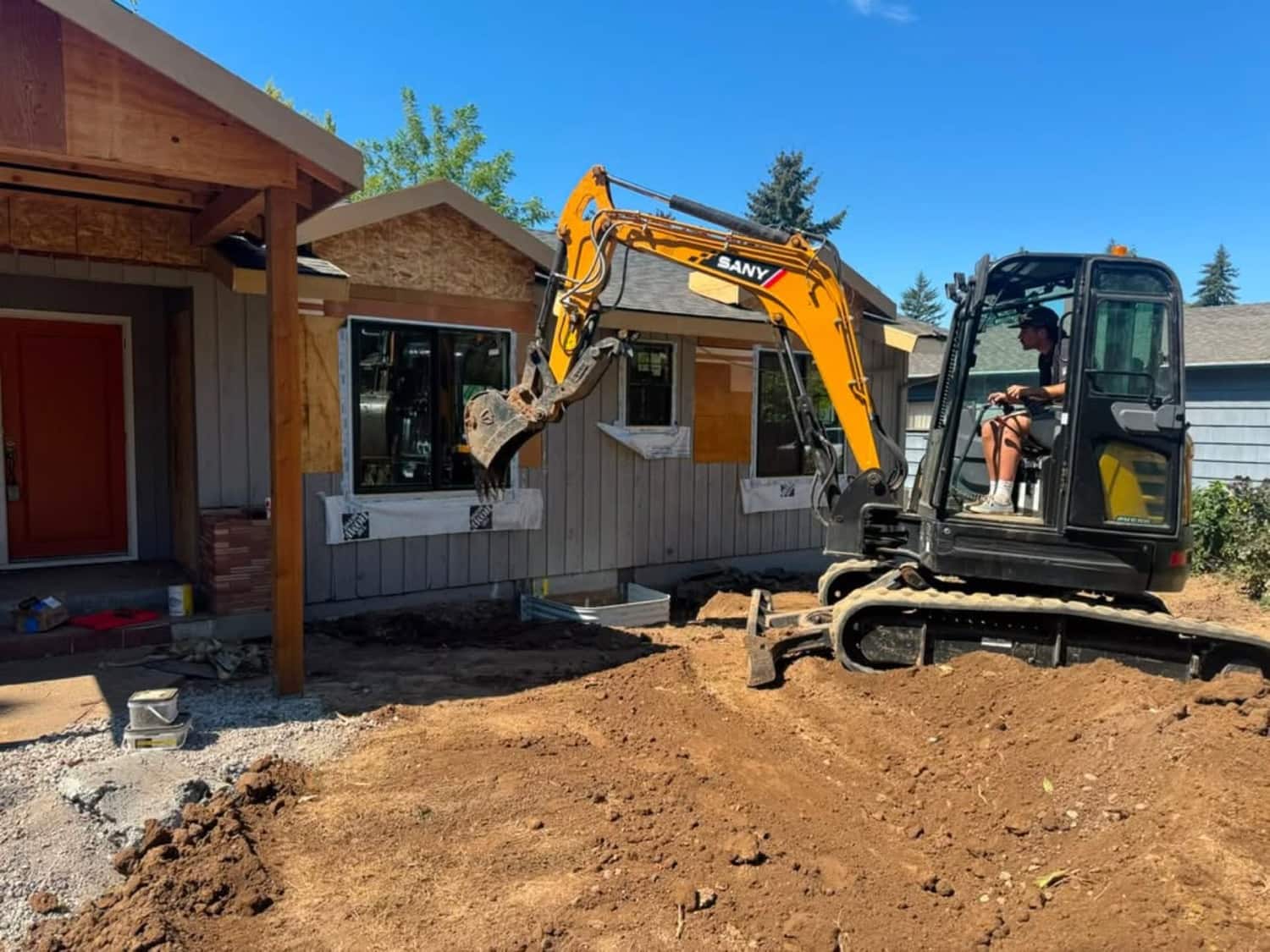 A&N excavator on a residential job site